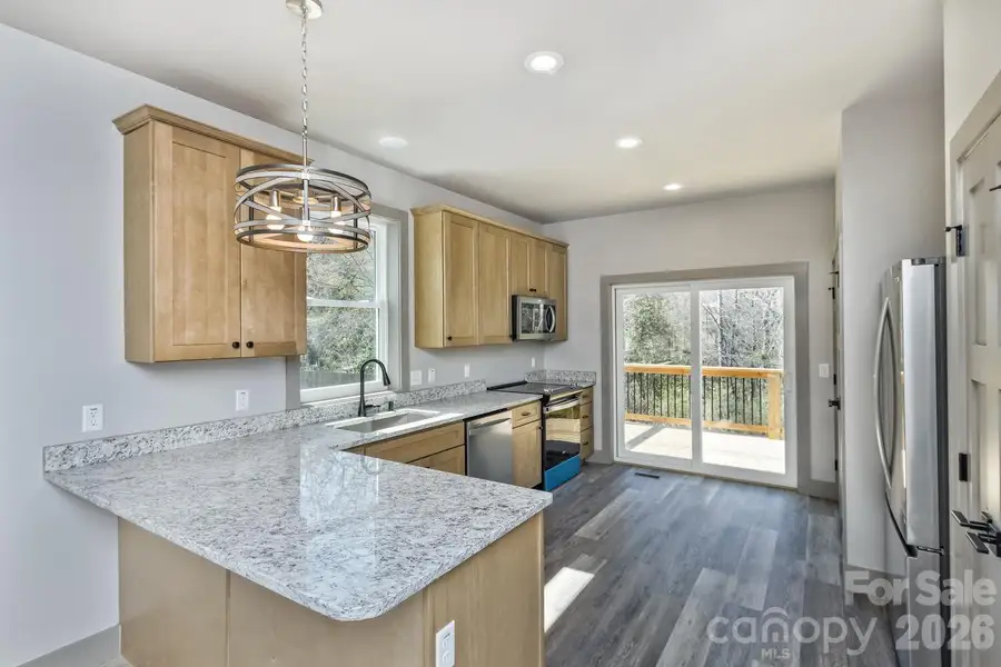 Furnished interior view inside a new home in , Asheville (Image 4).