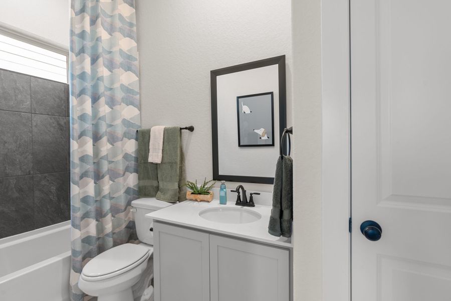 Furnished interior view inside a new home in The Crossvine, Schertz (Image 12).