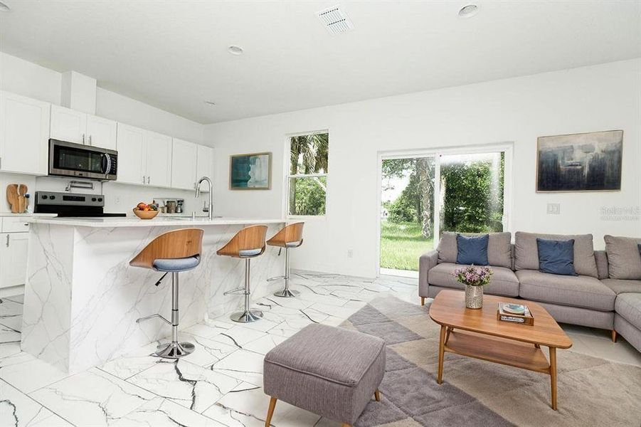 Furnished interior view inside a new home in , Apopka (Image 7).