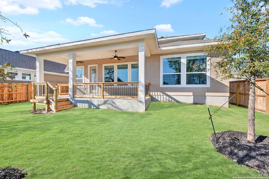 Exterior details and patio area of a home in Davis Ranch 60', San Antonio (Image 21).