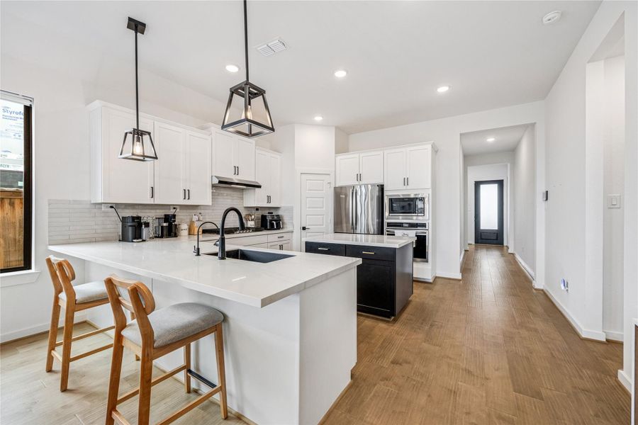 Furnished interior view inside a new home in , Cypress (Image 6).