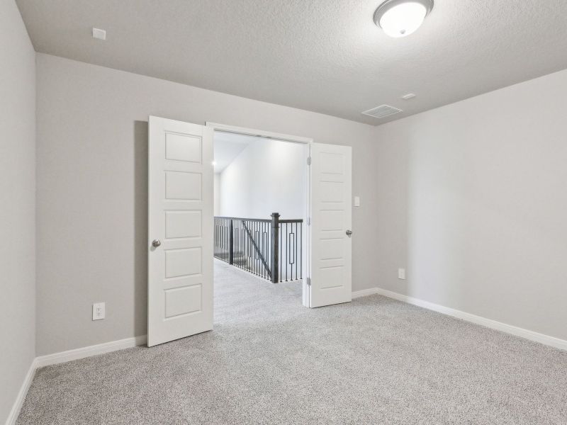 Game room in the San Jacinto floorplan at a Meritage Homes community.