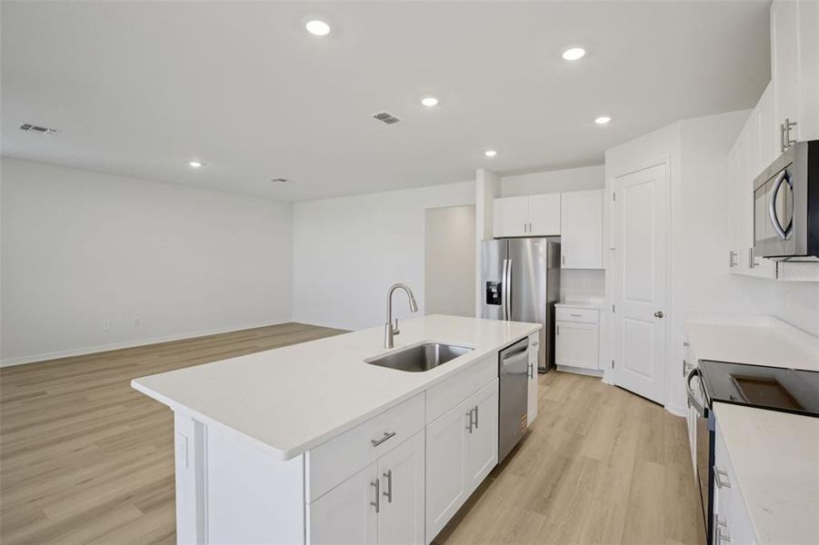 Furnished interior view inside a new home in Coasterra - Reserve Series, Palmetto (Image 13). Furnished interior view inside a new home in Coasterra - Reserve Series, Palmetto (Image 13).