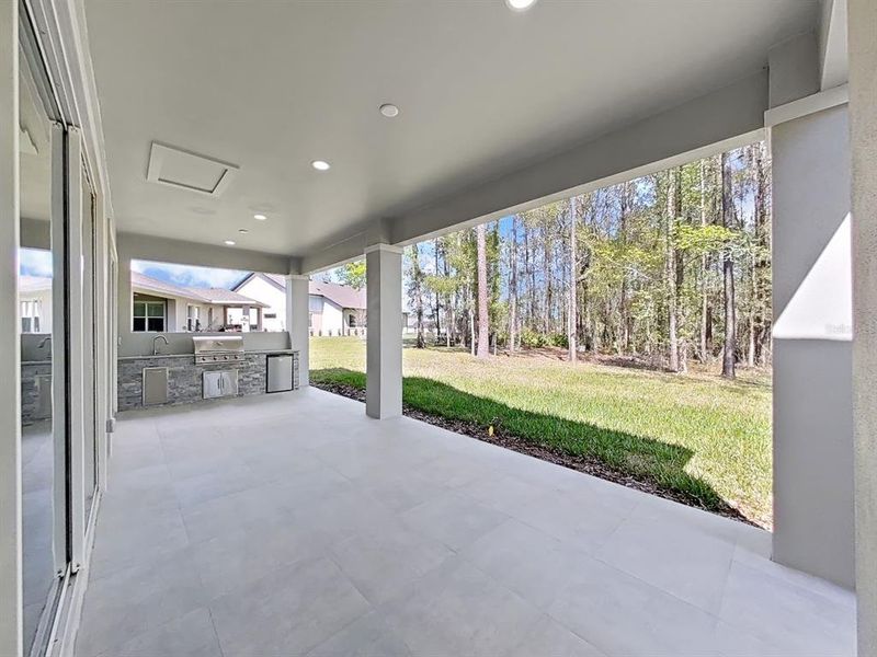 Exterior details and patio area of a home in Southern Hills Plantation, Brooksville (Image 28).