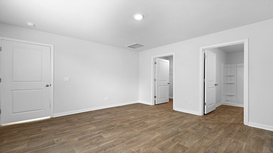 Spacious, unfurnished interior of a new home in Pine Hills at Cane Bay, Summerville (Image 13). Spacious, unfurnished interior of a new home in Pine Hills at Cane Bay, Summerville (Image 13).