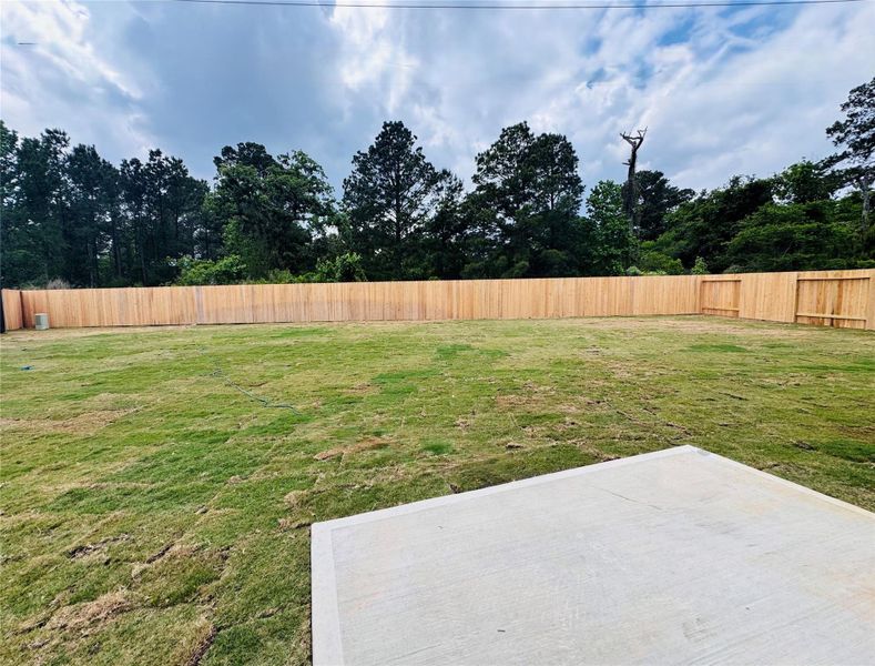 Exterior details and patio area of a home in Spring Creek Trails, Magnolia (Image 2). Exterior details and patio area of a home in Spring Creek Trails, Magnolia (Image 2).