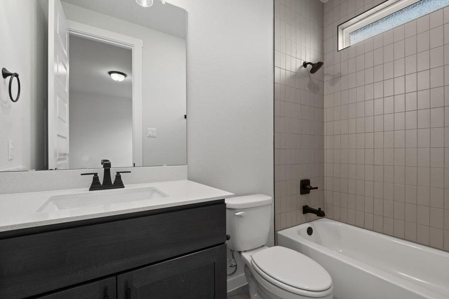 Furnished interior view inside a new home in Flora, Hutto (Image 10).