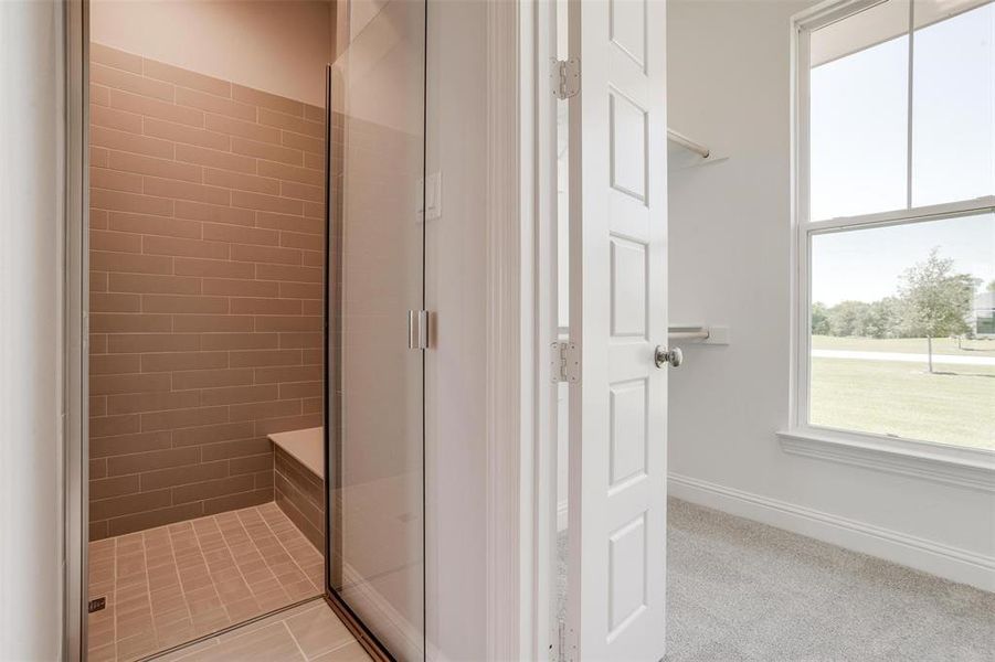 Bathroom with tile patterned floors