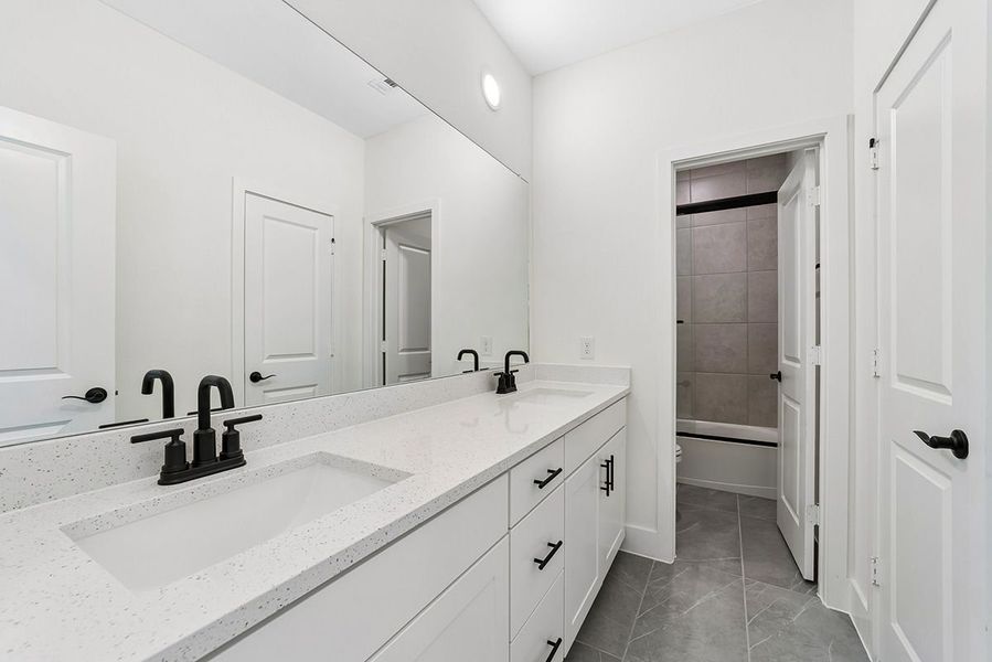 Representative furnished interior of a home built from the Leona by Landon Homes in Fields - East Village, Frisco (Image 36).