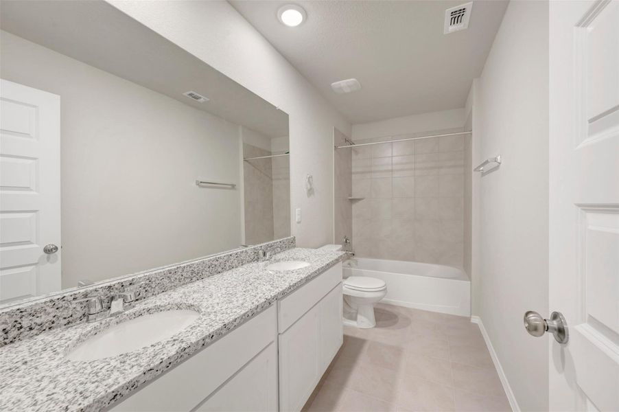 Furnished interior view inside a new home in Carillon, Manor (Image 7).