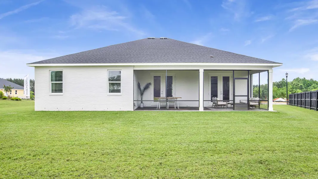 Exterior details and patio area of a home in Golden Gate, Naples (Image 3).