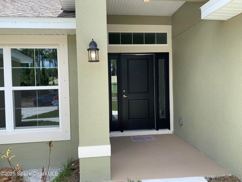 Exterior details and patio area of a home in Palm Bay, Palm Bay (Image 2). Exterior details and patio area of a home in Palm Bay, Palm Bay (Image 2).