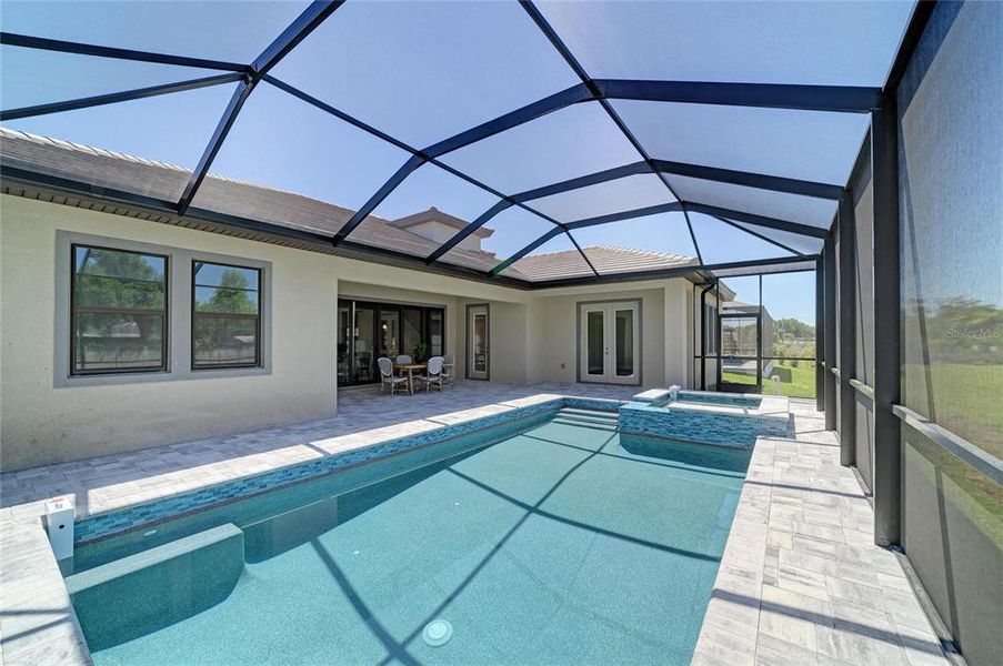 Exterior details and patio area of a home in Hidden Lakes, Brandon (Image 29).