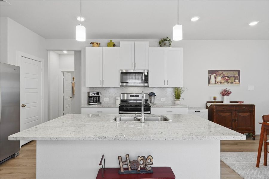 Add your favorite barstools to the island to give extra setting for family and friends to enjoy.