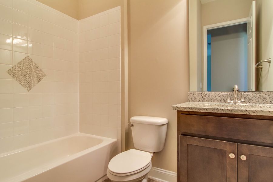 Representative furnished interior of a home built from the Lena by Riverside Homes in Hidden Creek at SilverLeaf 70' Series, St. Augustine (Image 12).