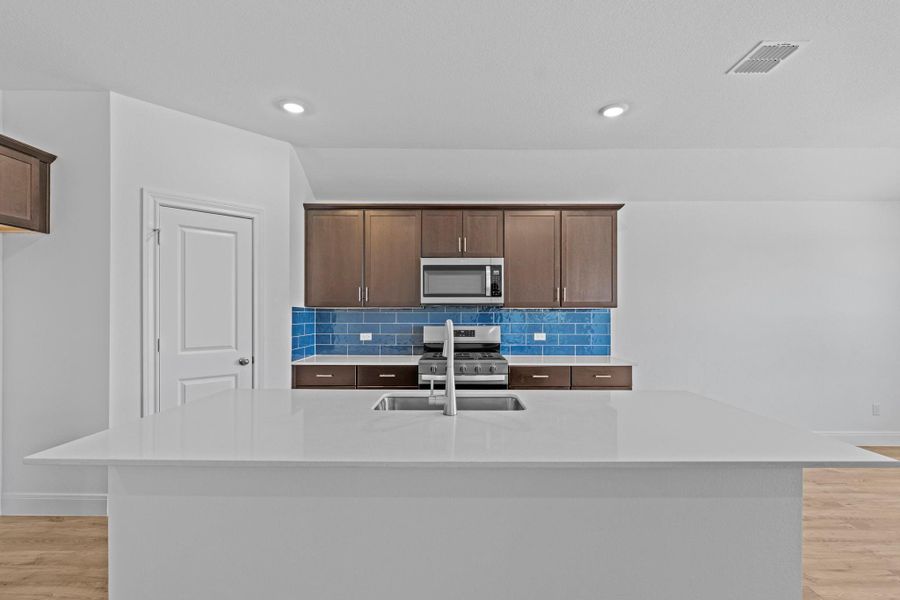 Furnished interior view inside a new home in Railhead, Cedar Creek (Image 11).