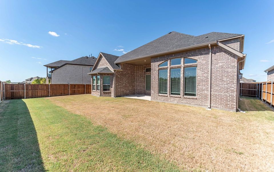 Exterior details and patio area of a home in Sonoma Verde, Rockwall (Image 2).