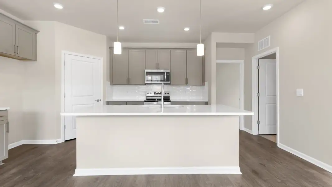 Furnished interior view inside a new home in The Villas at Galvins Ridge, Sanford (Image 6).