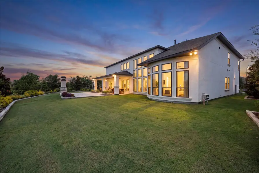 Exterior details and patio area of a home in Bridgeland, Cypress (Image 23).