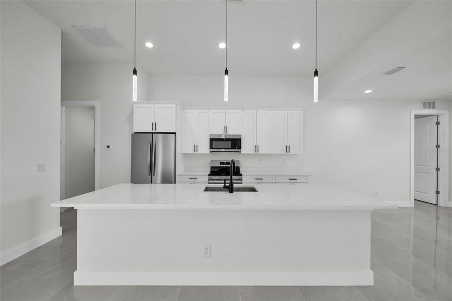 Furnished interior view inside a new home in , Port Charlotte (Image 9). Furnished interior view inside a new home in , Port Charlotte (Image 9).