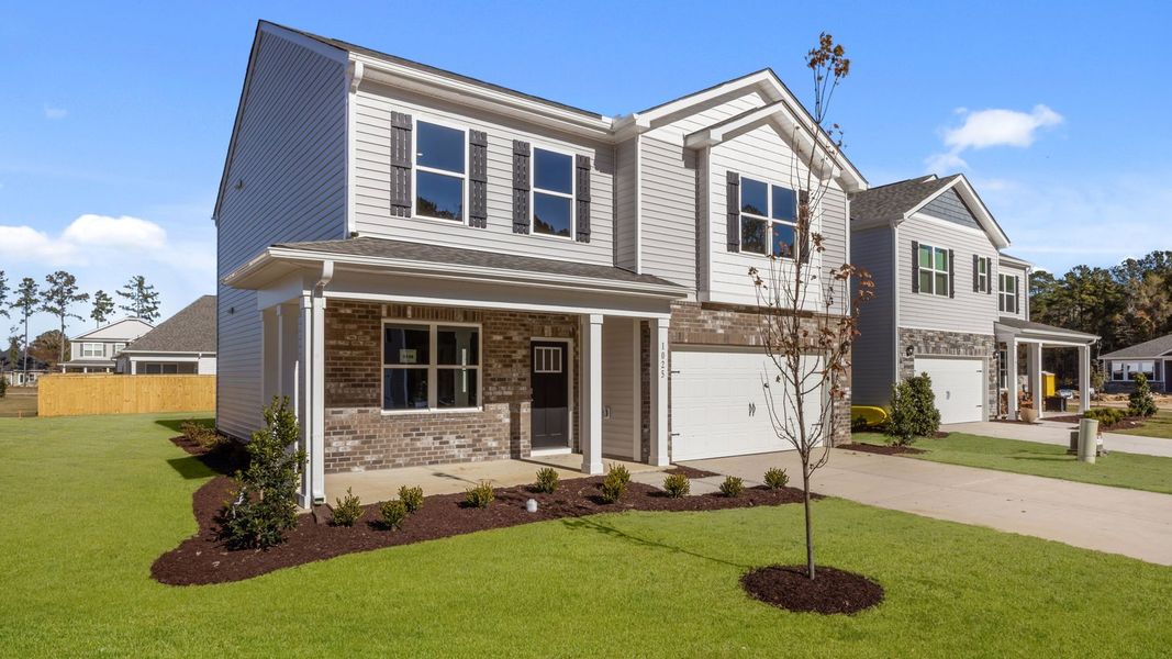 Front exterior of a new home in West New Bern, New Bern, NC, highlighting curb appeal (Image 21).
