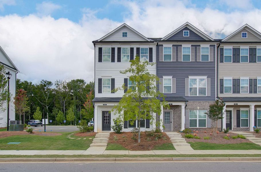 Front exterior of a new home in Nickel Creek at Newnan Crossing, Newnan, GA, highlighting curb appeal (Image 26). Front exterior of a new home in Nickel Creek at Newnan Crossing, Newnan, GA, highlighting curb appeal (Image 26).