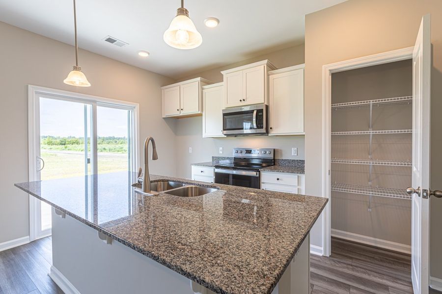 Representative furnished interior of a home built from the Dillon II by Great Southern Homes in Shady Grove, Conway (Image 12).