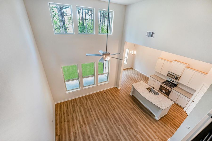 Furnished interior view inside a new home in Deer Pines, Conroe (Image 13).