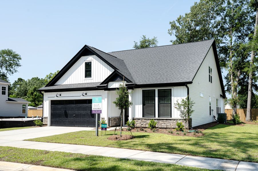 Front exterior of a new home in Huckleberry Estates, Conway, SC, highlighting curb appeal (Image 2).