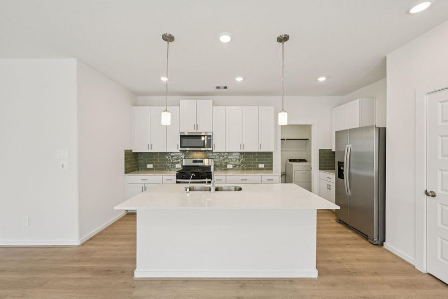 Furnished interior view inside a new home in Pine Lake Cove - Traditional Series, Montgomery (Image 7).