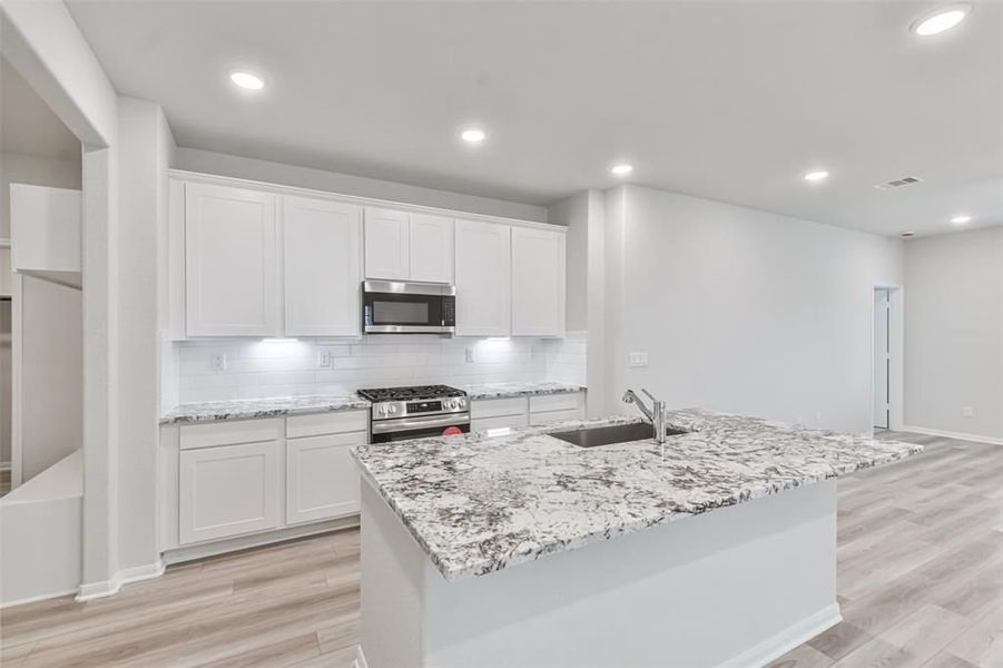 Furnished interior view inside a new home in Lakes at Black Oak, Magnolia (Image 42).