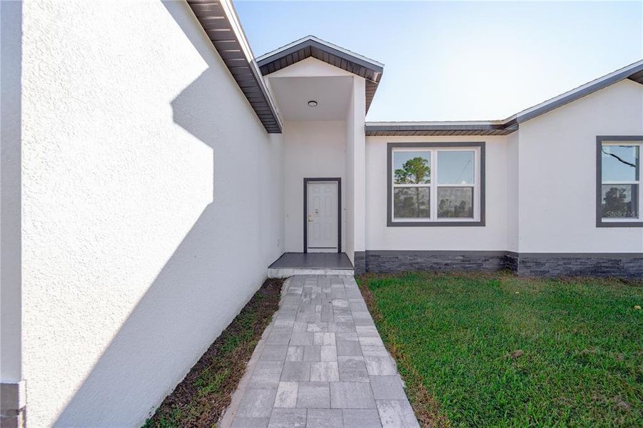 Exterior details and patio area of a home in , Port Charlotte (Image 3). Exterior details and patio area of a home in , Port Charlotte (Image 3).