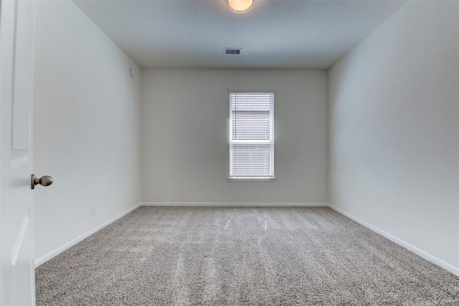 Spacious, unfurnished interior of a new home in Sunterra, Katy (Image 21).