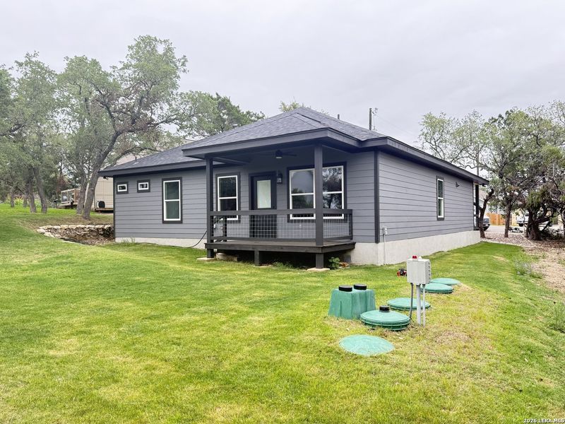 Exterior details and patio area of a home in , Spring Branch (Image 23).