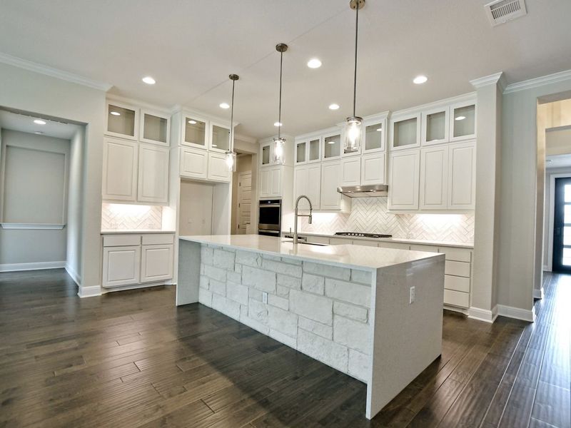 Representative furnished interior of a home built from the Madera II by Giddens Homes in Scofield Farms Estates, Georgetown (Image 235).