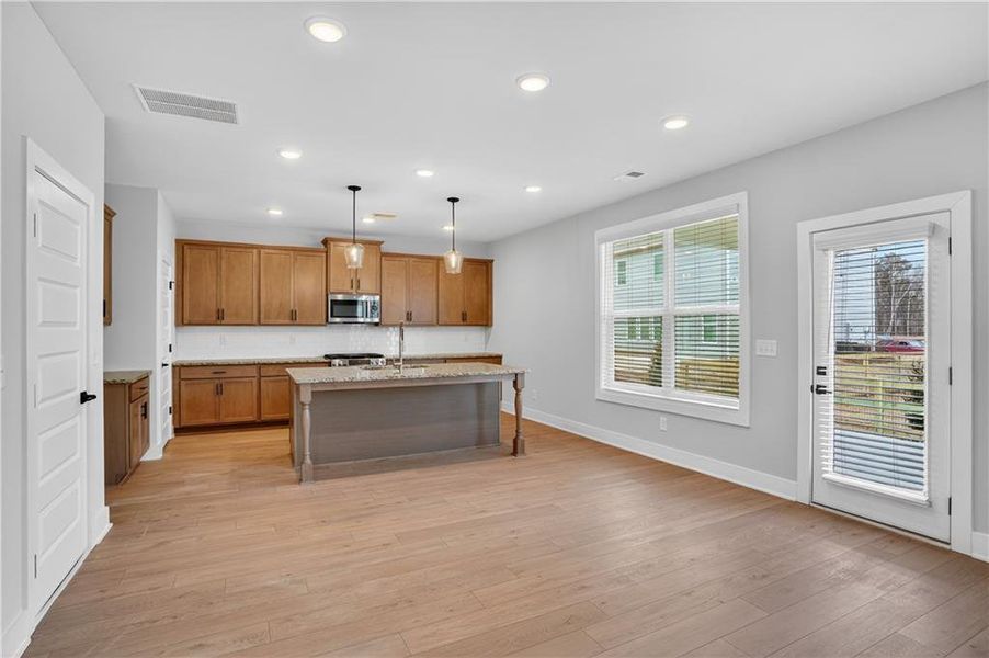 Furnished interior view inside a new home in The Fairways at Mirror Lake, Villa Rica (Image 7).