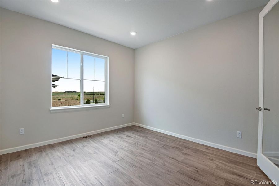 Spacious, unfurnished interior of a new home in Ensemble at The Aurora Highlands, Aurora (Image 32).