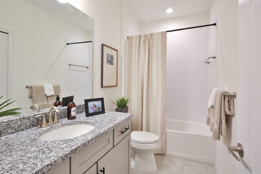 Representative furnished interior of a home built from the Morgan by Neal Communities in SkySail, Naples (Image 5).