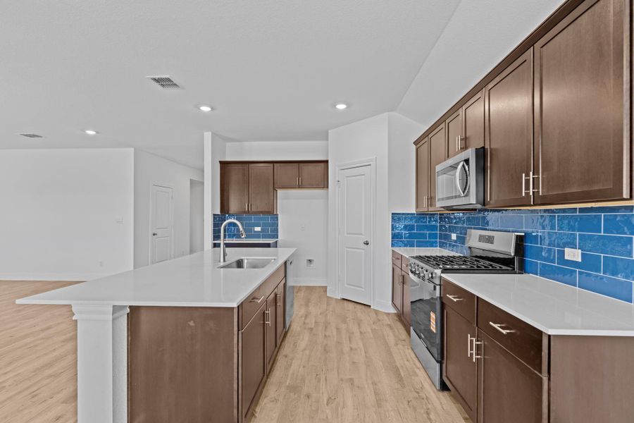 Furnished interior view inside a new home in Railhead, Cedar Creek (Image 8).