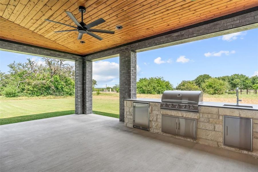 Outdoor fireplace for indoor/outdoor entertaining.
