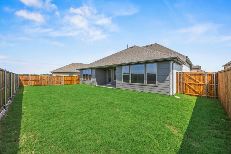 Exterior details and patio area of a home in Tinsley Meadows, Van Alstyne (Image 2). Exterior details and patio area of a home in Tinsley Meadows, Van Alstyne (Image 2).