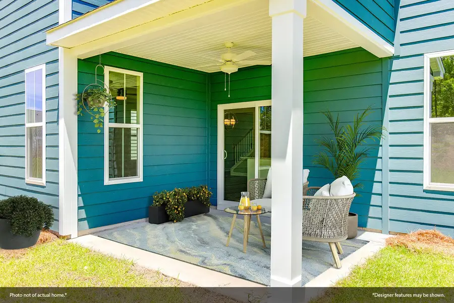 Exterior details and patio area of a home in Indigo at Abbey Preserve, Wilmington (Image 2). Exterior details and patio area of a home in Indigo at Abbey Preserve, Wilmington (Image 2).