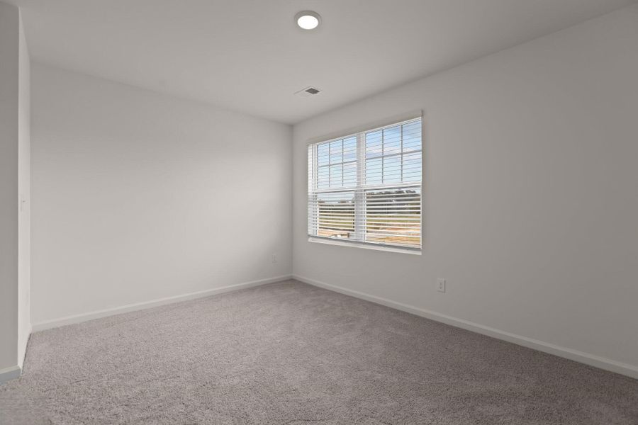 Representative unfurnished interior of a home built from the Hubble by Starlight Homes in Andalusia, Loris (Image 26).