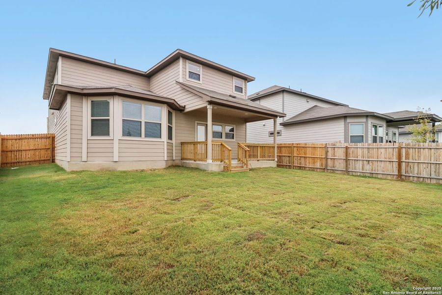 Exterior details and patio area of a home in Remington Ranch, San Antonio (Image 27).