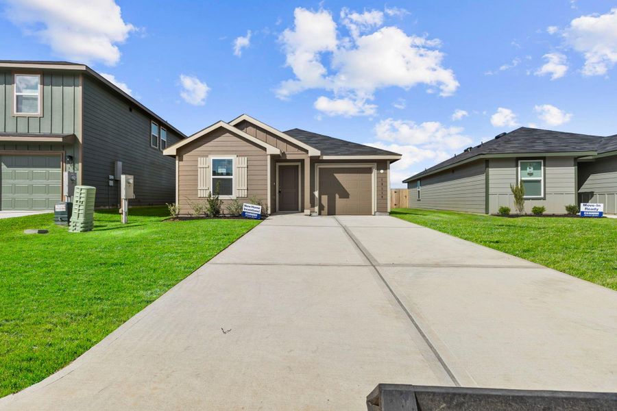 Front exterior of a new home in McCrorey Trails, Conroe, TX, highlighting curb appeal (Image 2). Front exterior of a new home in McCrorey Trails, Conroe, TX, highlighting curb appeal (Image 2).