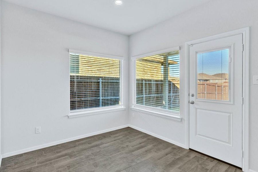 Nice windows in the open dining area, can fit a large table and chairs. Nice windows in the open dining area, can fit a large table and chairs.