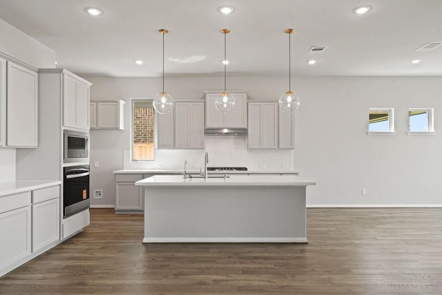 Furnished interior view inside a new home in Bridgeland 55', Cypress (Image 7).