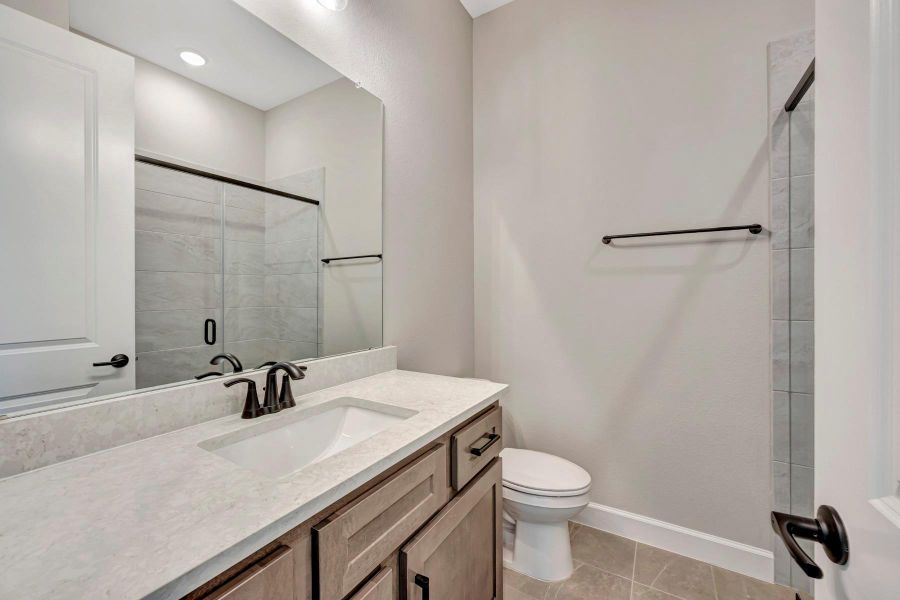 Furnished interior view inside a new home in COLTON - Reserve Collection, Todd Mission (Image 10).