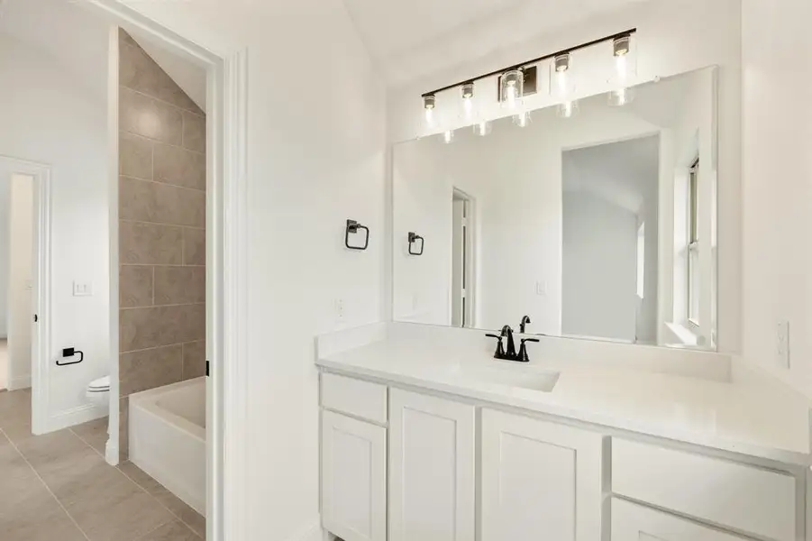 Furnished interior view inside a new home in Painted Tree Woodland District 50, McKinney (Image 7). Furnished interior view inside a new home in Painted Tree Woodland District 50, McKinney (Image 7).