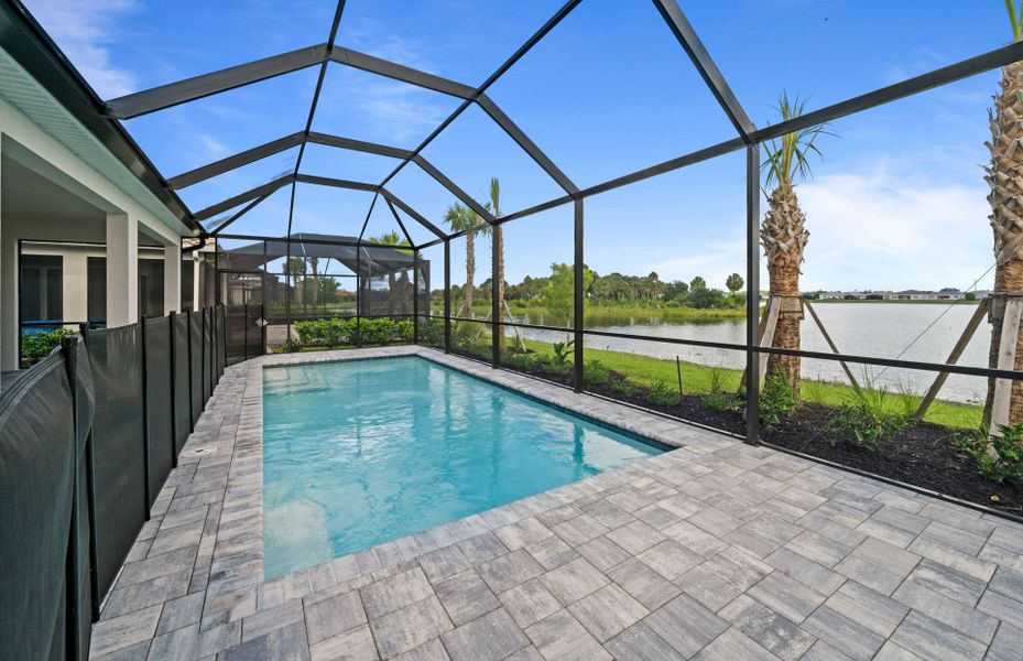 Exterior details and patio area of a home in Del Webb Oak Creek, North Fort Myers (Image 24).